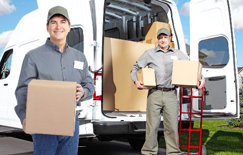 Management reviewing health and safety standards in a storage environment